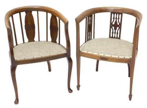 Two similar Edwardian mahogany tub chairs, each with pierced backs, overstuffed seats in later...