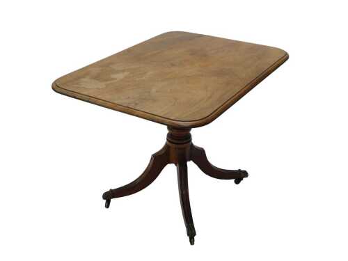 A 19thC mahogany tilt top occasional table, the oblong top raised above a reeded column, on...