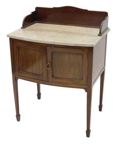 A Victorian mahogany washstand, the three part galleried back raised above a section of marble and two cupboard doors, the whole raised on square tapering legs terminating in spade feet, 77cm high, 69cm wide, 49cm deep.