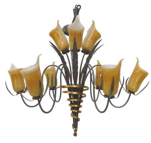 A Hollywood Regency style 1970s chandelier, with naturalistic entwined metal body and yellow...