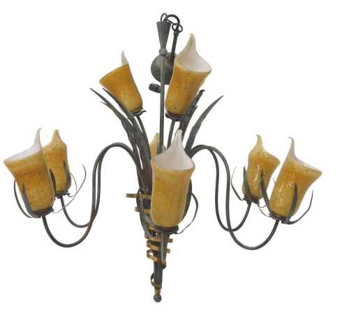 A Hollywood Regency style 1970s chandelier, with naturalistic entwined metal body and yellow...