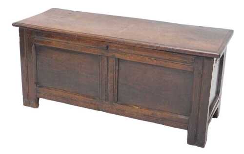 A late 17thC oak two panelled coffer, of plain rectangular form, on block stiles, 56cm high,...
