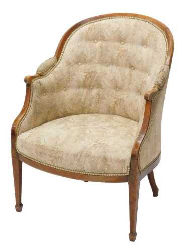 A Victorian show frame armchair, the serpentine back and seat with later floral material, on...