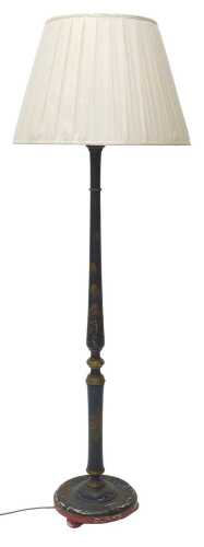 A 20thC Japanned standard lamp, with cream shade set with bird, 178cm high. WARNING! This lot...
