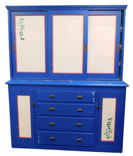A 19thC pine kitchen dresser, with fixed cornice raised above three sliding doors, revealing...