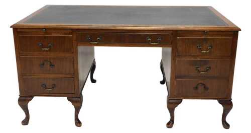 A 19thC twin pedestal writing desk, the one piece blue leather top raised above a frieze drawer...