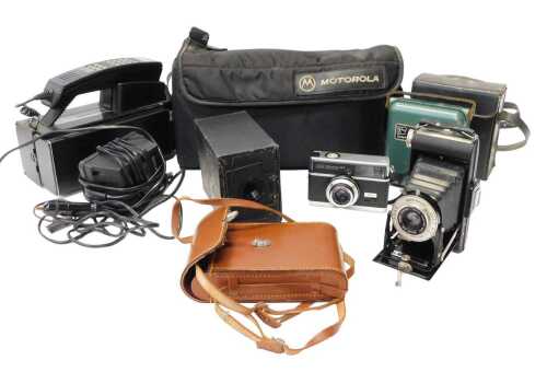Cameras, to include a Kodak Six-20 folding Brownie camera, in a brown leather case, a Zeiss Ikon...