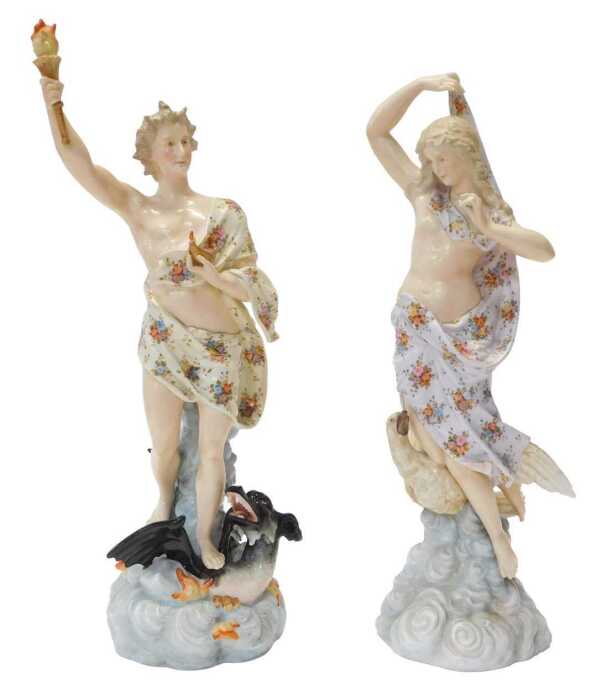 A pair of late 19thC Continental porcelain figures, modelled as Hebe beside a raven, and...