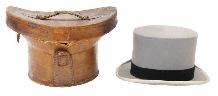 A Wood Row Piccadilly London grey felt top hat, contained in a leather hat box.