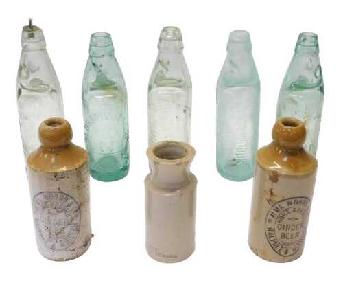 A group of stoneware and glass bottles, to include a W Berry Manchester and London stoneware jar,...