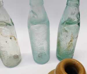 A group of stoneware and glass bottles, to include a W Berry Manchester and London stoneware jar,... - 2
