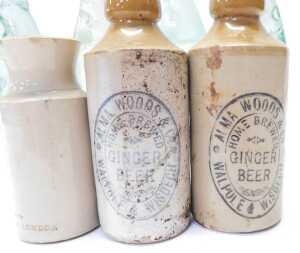 A group of stoneware and glass bottles, to include a W Berry Manchester and London stoneware jar,... - 4