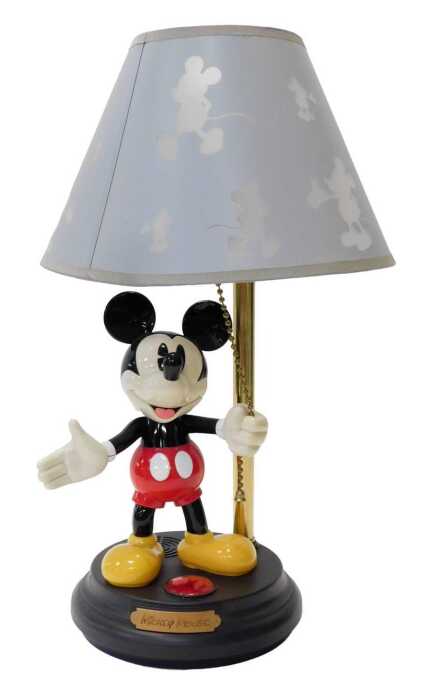 A Mickey Mouse table lamp, the shade decorated with silhouettes of Mickey Mouse, the base...