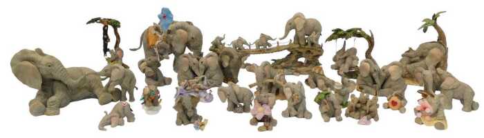 A group of Tuskers figures, to include Gentle Touch 90990, Precious Cargo 91123, Love is a...