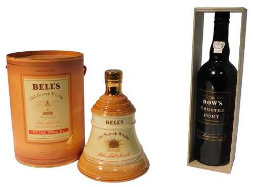 A bottle of Dow's Crusted Port, bottled 2012, in a presentation box, and a bottle of Bell's Old...