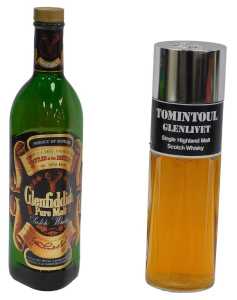 A bottle of Glenfiddich Pure Malt Scotch whisky, 75cl, together with a bottle of Tomintoul...