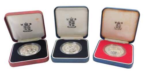 Three Royal Mint silver proof crowns, to include a United Kingdom Coronation 40th Anniversary...