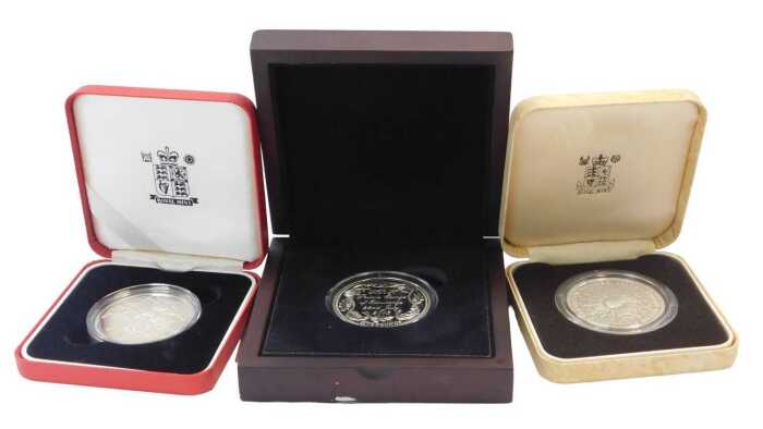 A Guernsey silver five pound coin, celebrating the Royal Birth of HRH Prince George of Cambridge,...