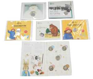 A group of Royal Mint commemorative fifty pence coins, comprising two for Paddington, The...