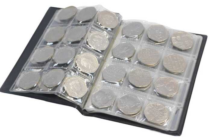A World Coin stock album, containing forty seven Elizabeth II fifty pence coins, to include...
