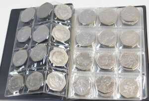 A World Coin stock album, containing forty seven Elizabeth II fifty pence coins, to include... - 2
