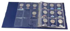 A Change Checker folder, containing thirteen five pound coins, a one pound coin, five fifty...
