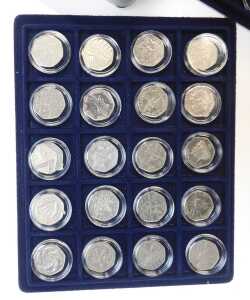 Queen Elizabeth II coinage, comprising fifty two fifty pence coins, to include Peter Rabbit and... - 2