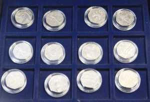 Queen Elizabeth II coinage, comprising fifty two fifty pence coins, to include Peter Rabbit and... - 3