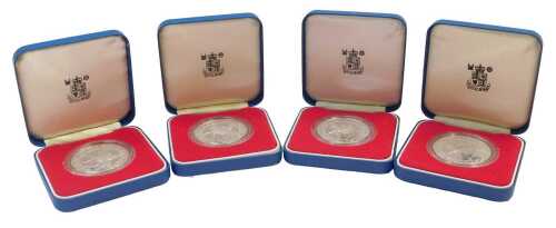Four Royal Mint Elizabeth II 1977 silver proof commemorative crowns, boxed.