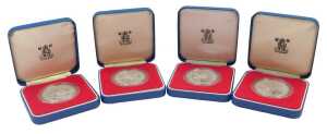 Four Royal Mint Elizabeth II 1977 silver proof commemorative crowns, boxed.