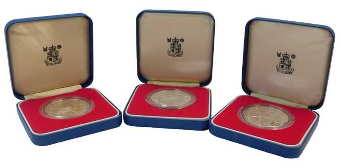 Three Royal Mint Elizabeth II 1977 silver proof commemorative crowns, boxed.