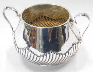A Victorian silver twin handled sugar bowl, of semi fluted form, raised on an oval foot, Martin,... - 2