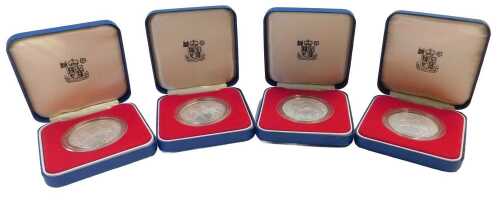 Four Royal Mint Elizabeth II 1977 commemorative silver proof crowns, boxed.