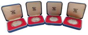 Four Royal Mint Elizabeth II 1977 commemorative silver proof crowns, boxed.