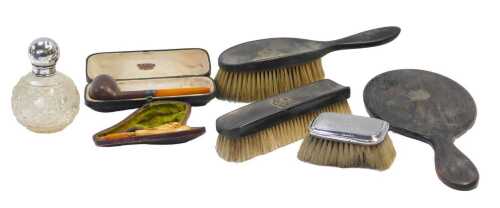 A group of small silver and other related items, to include an ebonised three piece dressing...