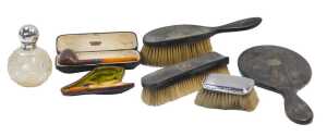 A group of small silver and other related items, to include an ebonised three piece dressing...