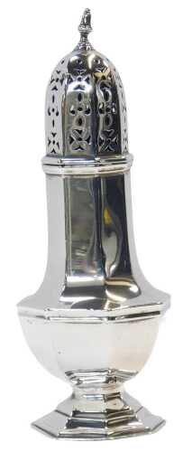 An Edward VII silver sugar castor, of baluster form, raised on an octagonal outswept foot,...