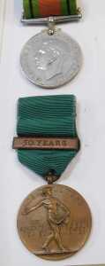A group of ephemera relating to Walter (Tim) Houldershaw, to include the WWII Defence Medal, an... - 5
