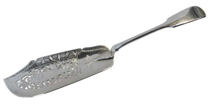 A Victorian silver Fiddle pattern fish slice, with pierced bright cut engraved fish and leaf...