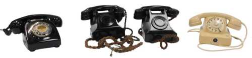 Three black Bakelite telephones, one with dial and two lacking dials, together with a 1960s...