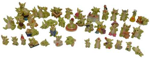 A group of Real Musgrave Collectable World Studios Limited Land of Legend pocket dragon figures,...