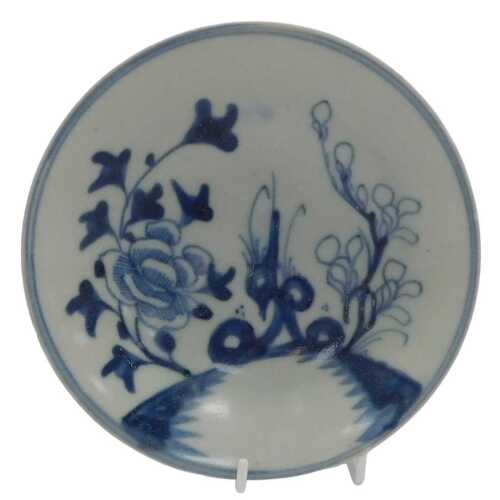 An early 19thC Chinese blue and white Magnolia pattern Tek Sing cargo saucer, bearing Nagel...