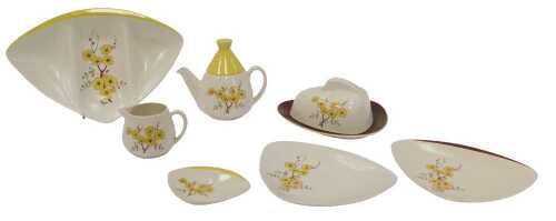 A group of Carltonware pottery Mimosa pattern ceramics, comprising a teapot, triangular-shaped...