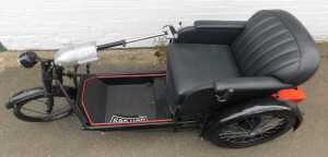 A 1936 Argson Electric three wheeled invalid carriage, registration DBH 889, in black trim with... - 3