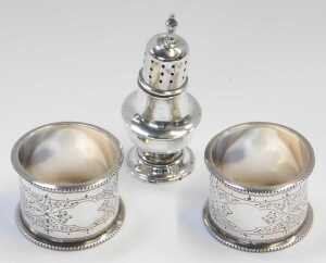 A pair of Victorian silver napkin rings, profusely decorated with leaf and flower bud motifs,... - 2