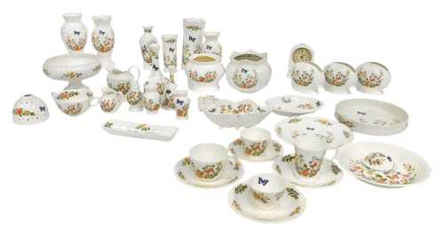 A group of Aynsley Cottage Garden pattern porcelain, to include vases, mantel clock, pedestal...