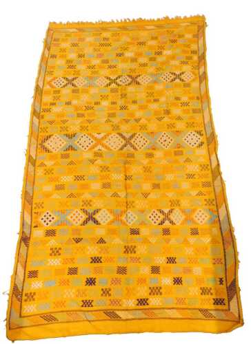 A flat weave Kilim rug or wall hanging, orange ground, decorated with multiple rows of geometric...