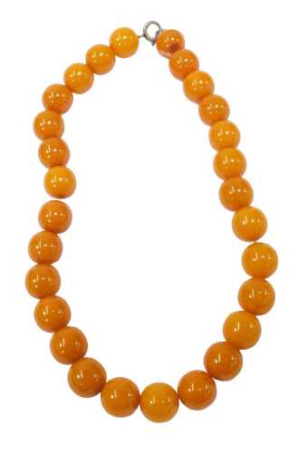 An imitation butterscotch amber beaded necklace, with spherical beads, 1.5cm diameter, on...