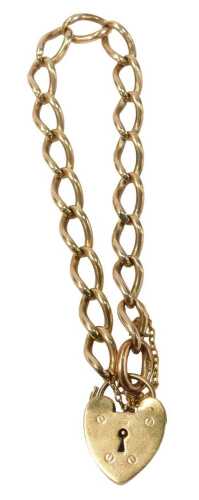A 9ct gold curb link bracelet, with safety chain and heart shaped padlock clasp, 16cm long, 17.2g.