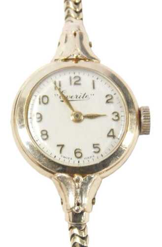 An Everite 9ct gold cased lady's wristwatch, with a silvered numeric dial, with gold hands, 15mm...